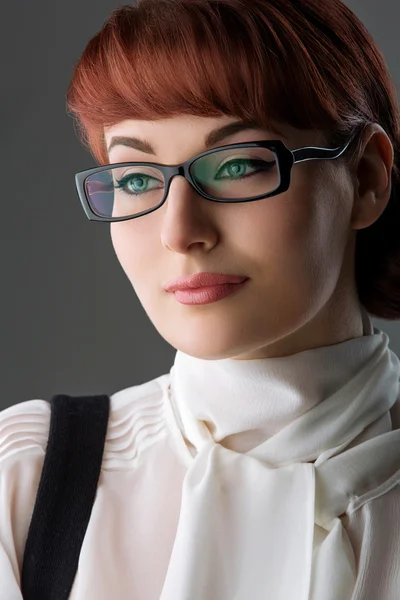 Beautiful young woman in glasses — Stock Photo, Image