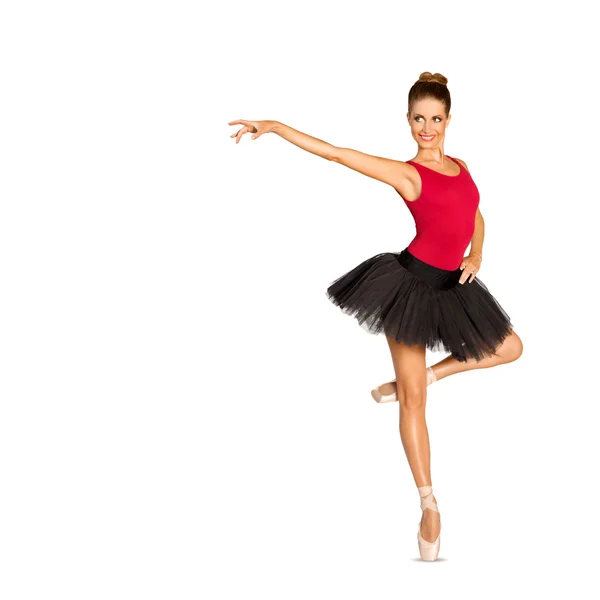 Красивая балерина в черной юбке из пачки — стоковое фото