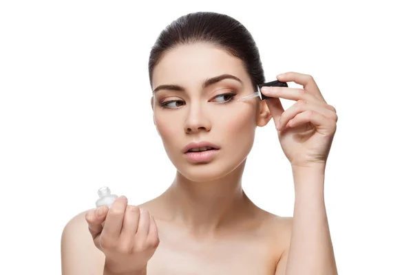 Girl applying serum — Stock Photo, Image