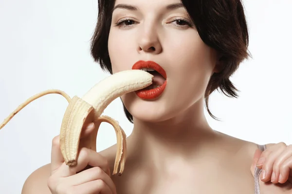 Szexi lány egy banánt. Fehérnemű. Smink. Érzelmek. Szenvedély. — Stock Fotó
