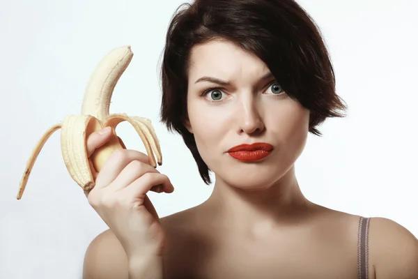 Sexy girl with a banana. Underwear. Makeup. Emotions. — Stock Photo, Image