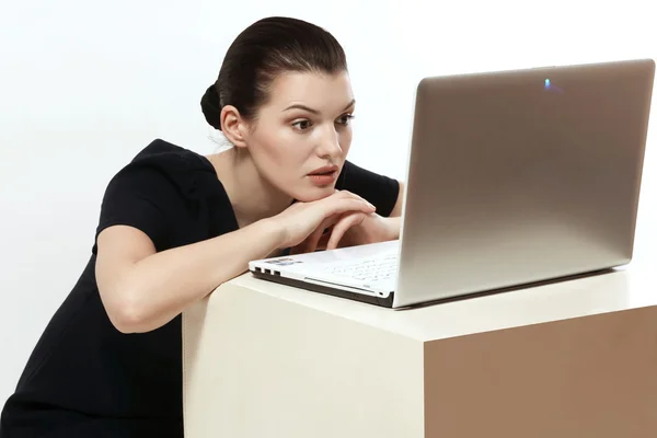 Beautiful and smart girl with a laptop. Computer. Emotions. — Stock Photo, Image