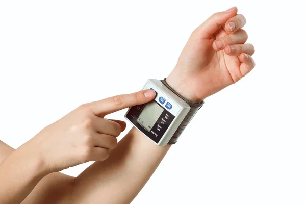 Hand with the tonometer — Stock Photo, Image