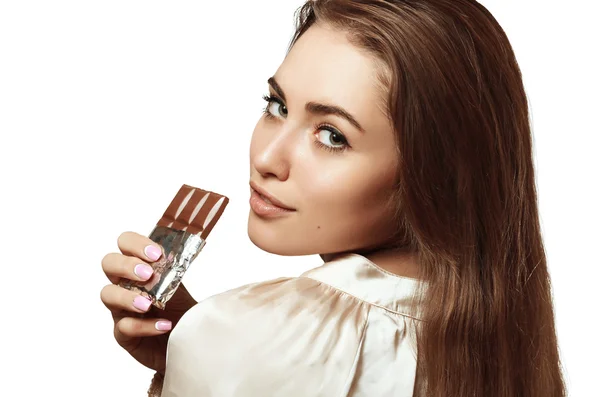 Beautiful and lovely girl holding chocolate — Stock Photo, Image