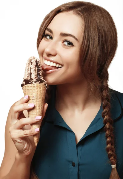 Young and beautiful girl eating chocolate ice cream — Stock Photo, Image