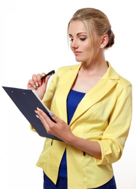 iş kadını ile bir klasör ve elinde kalem