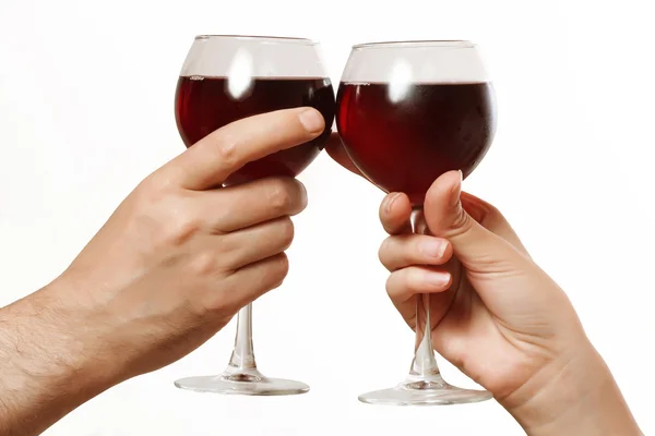 Copos de vinho em uma mulher e uma mão masculina — Fotografia de Stock