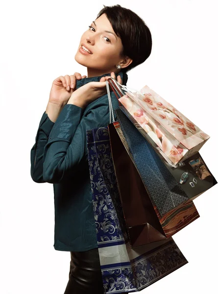 Dívka s nákupy v pytlích, Shopaholic, balíčky s věcmi — Stock fotografie