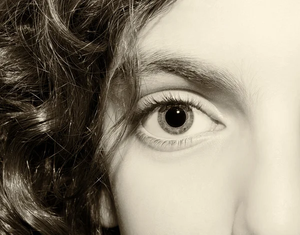 Makro zblízka portrét mladých dívek ročníku oči. — Stock fotografie