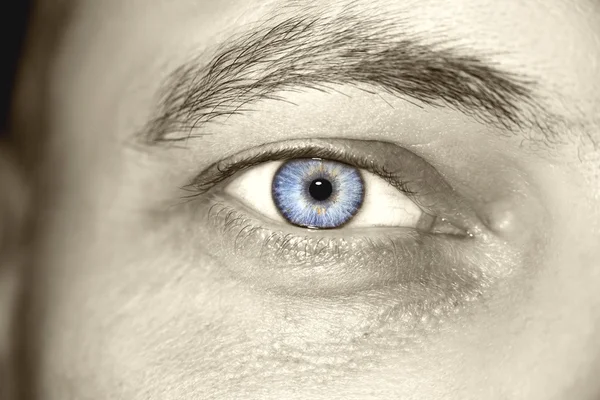 Image of man\'s vintage eye close up.