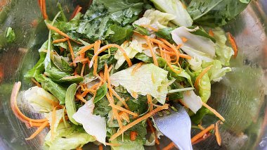 Vegetarian salad with carrots and lettuce. High quality photo.