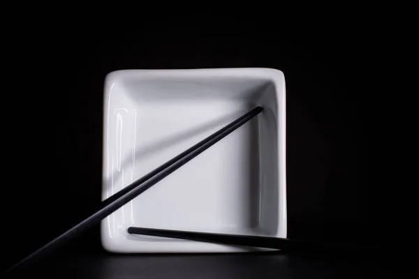 Stainless Steel Chopsticks White Square Bowl Black Background — Stock Photo, Image