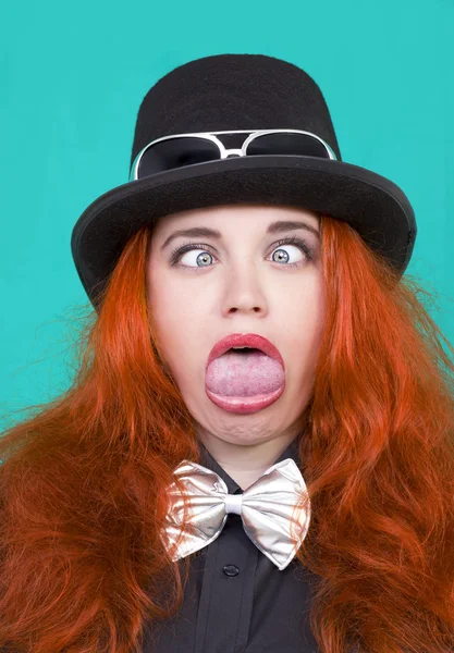 Young redhead woman making squint Stock Image