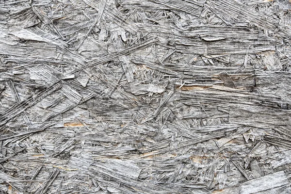 Fragmento de virutas de madera prensada antigua como textura de fondo — Foto de Stock