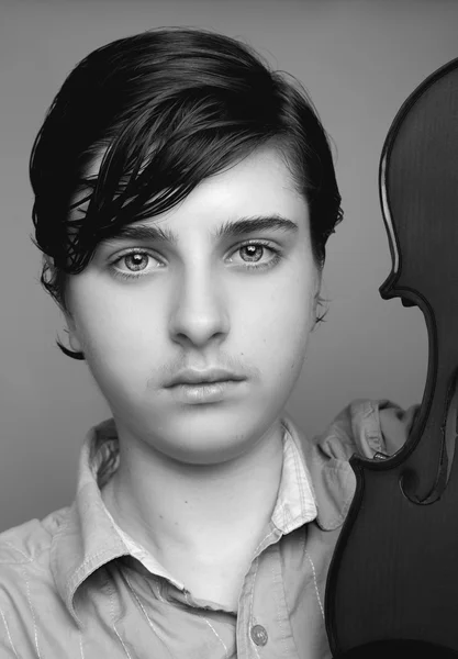 Beautiful boy holding a violin — Stock Photo, Image