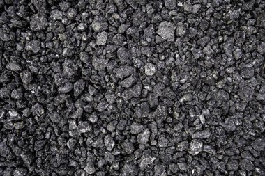 Eski bir yolda asfalt taşlarının müfrezesi