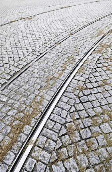 Tram tracks op een straat in Lissabon — Stockfoto