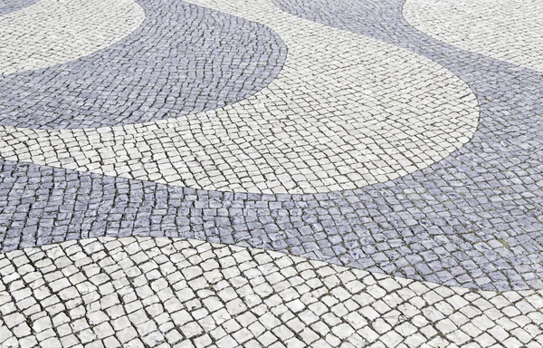 Tipico pavimento in pietra di Lisbona Fotografia Stock