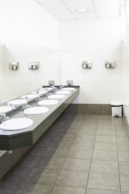 Sinks in a public bathroom clipart
