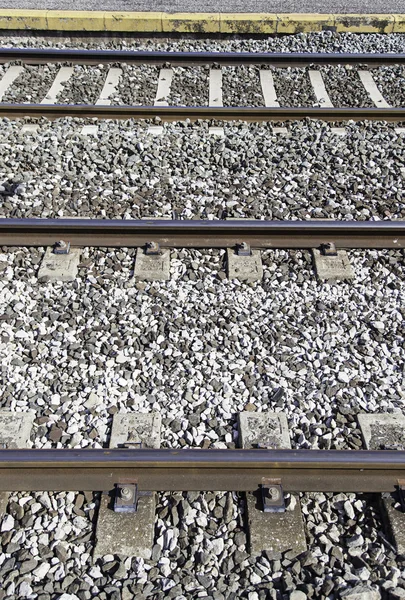 Railroad tracks at a station — Stock Photo, Image