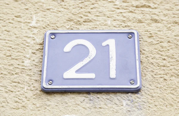 Number twenty one on a wall — Stock Photo, Image