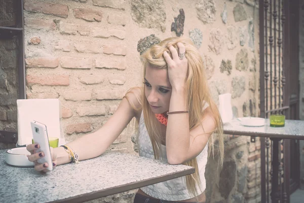 Young girl with mobile — Stock Photo, Image