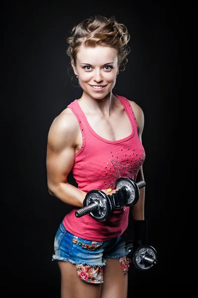 Fit woman with dumbbells — Stock Photo, Image