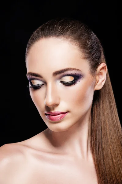 Girl in the studio on a black background make-up — Stock Photo, Image