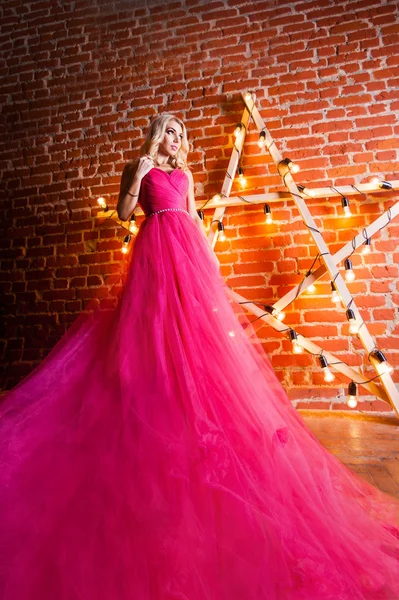 Girl in pink fashion dress — Stock Photo, Image