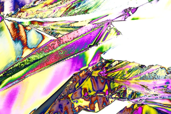 Microcrystals of tartaric acid in polarized light — Stock Photo, Image