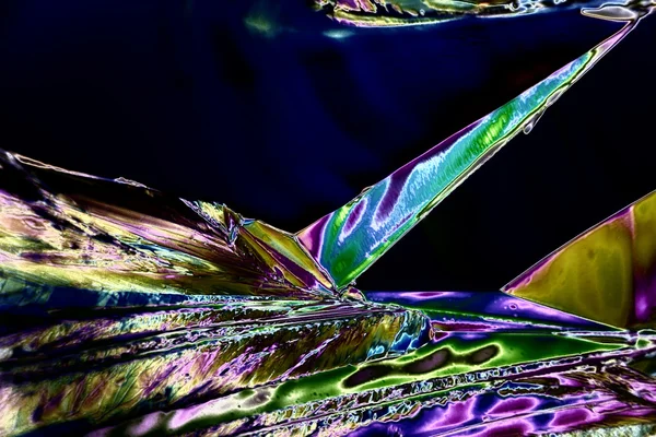 Microcrystals of tartaric acid in polarized light — Stock Photo, Image