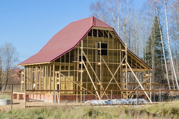 Egy vidéki ház építése Stock Kép
