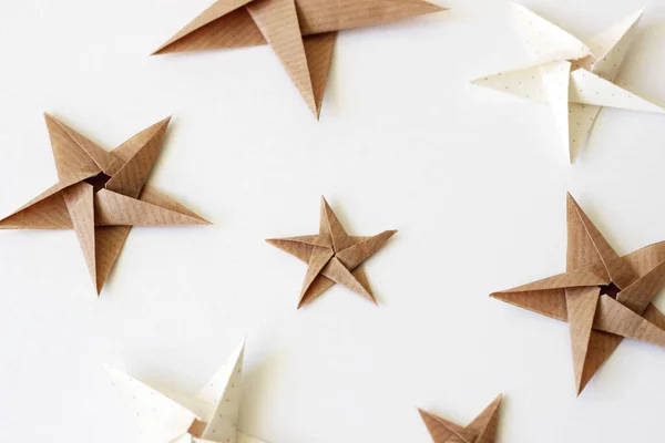 Beige Kraftpapier Origami Sterren Achtergrond Kerstvakantie Decoraties Rechtenvrije Stockfoto's