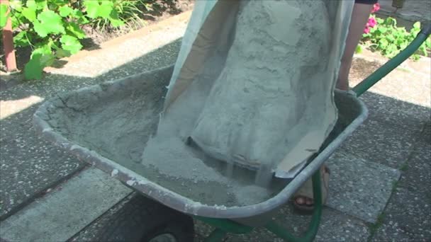 Concrete mixes shovel — Stock Video