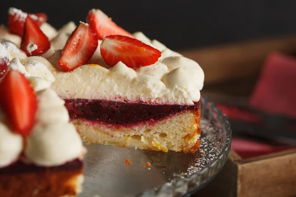 Tart with strawberries and cherry and whipped cream — Stock Photo, Image