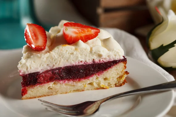 Tart with strawberries and cherry and whipped cream — Stock Photo, Image