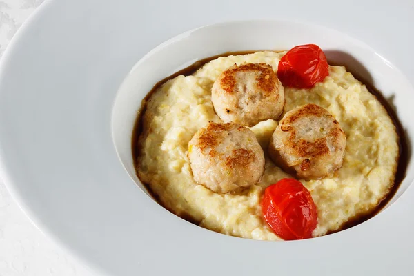 Millet porridge and rissoles — Stock Photo, Image