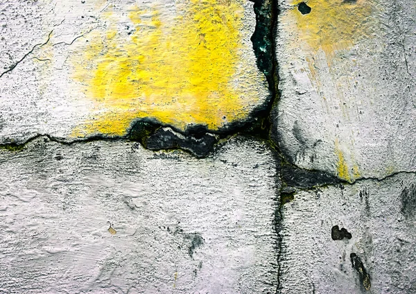 Croix de fissure abstraite sur plâtre blanc — Photo