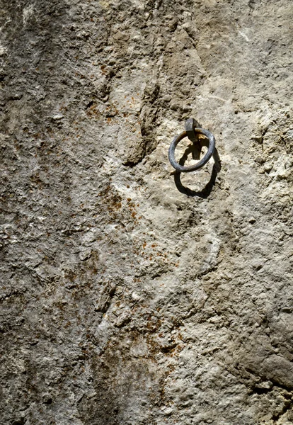 Climbing iron ring on a rock wall — Stock Photo, Image