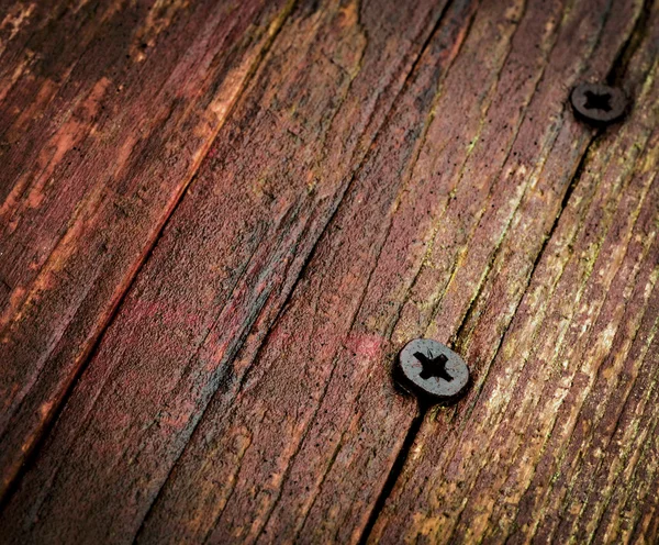 Two screw in old wood — Stock Photo, Image