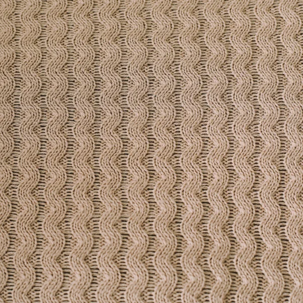 Knitted texture background. Knitting pattern of wool. Knitting. Texture of woolen fabric for wallpaper and abstract background. — Stock Photo, Image