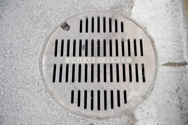 Covered Manhole on Street — Stock Image Covered Manhole on Street Stock Picture
