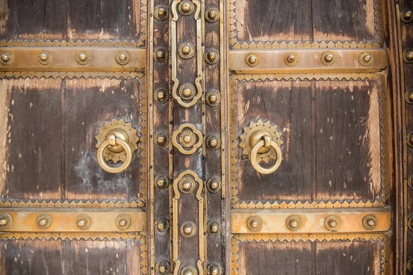 Wooden Door with Doorknockers — Stock Photo, Image