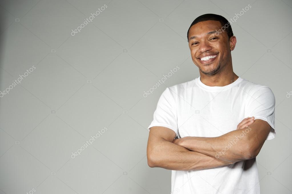 Black Male Wearing A White Top