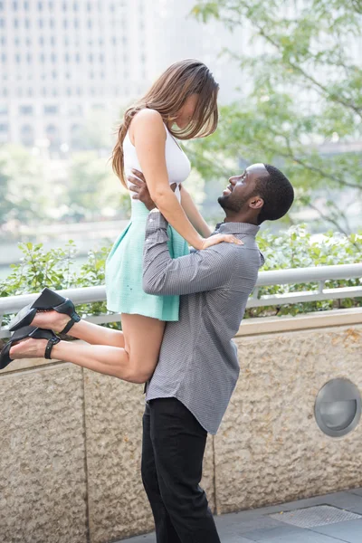 Boy holding his lover in arms — Stock Photo, Image