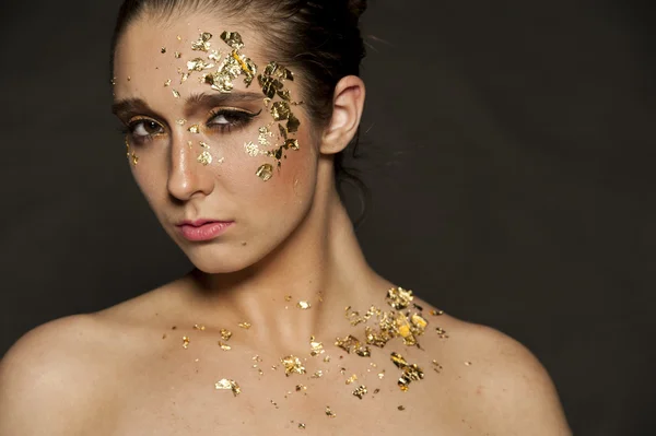 Gouden make-up vlokken — Stockfoto