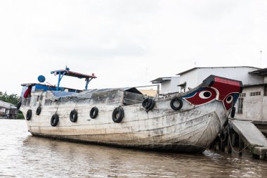 Large Boat on River Banks