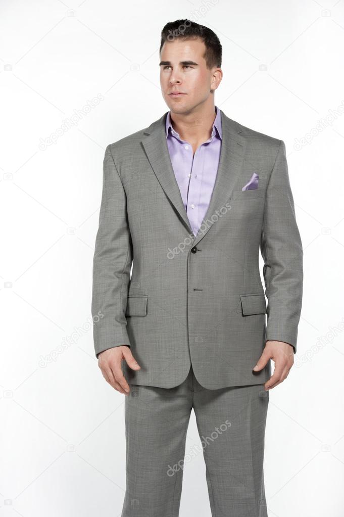 Caucasian Athletic Male in Fitted Gray Suit