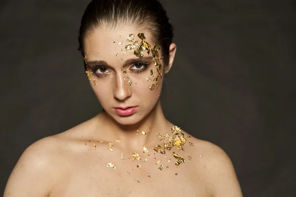 Vločky zlaté make-up — Stock fotografie