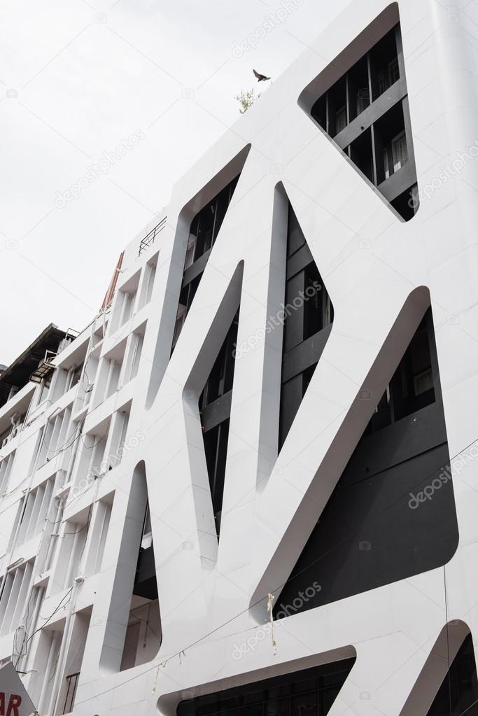 A white colored contemporary architectured building